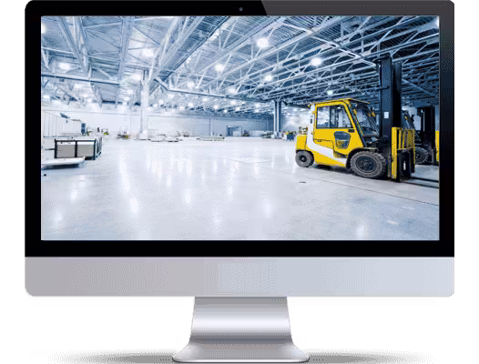 a spacious warehouse with a yellow vehicle bigsun