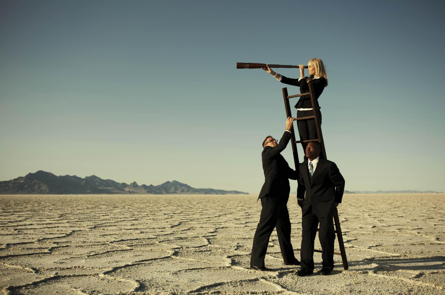 small business team searching new opportunities through telescope bigsun