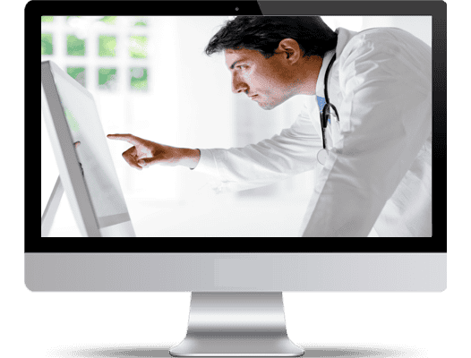 a doctor using a desktop